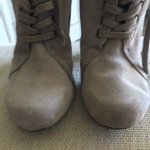 Nine West tan suede lace up booties. Leather upper.